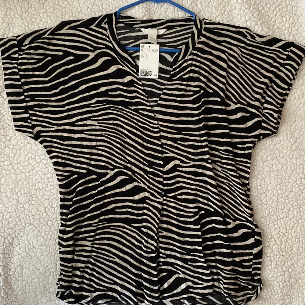H&M blouse size 10. Black/White striped